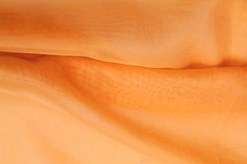 Ткань вуаль TIA 52 г/м² шир.280см, 100%ПЭ, цв.034 бледно оранжевый рул.25-30м